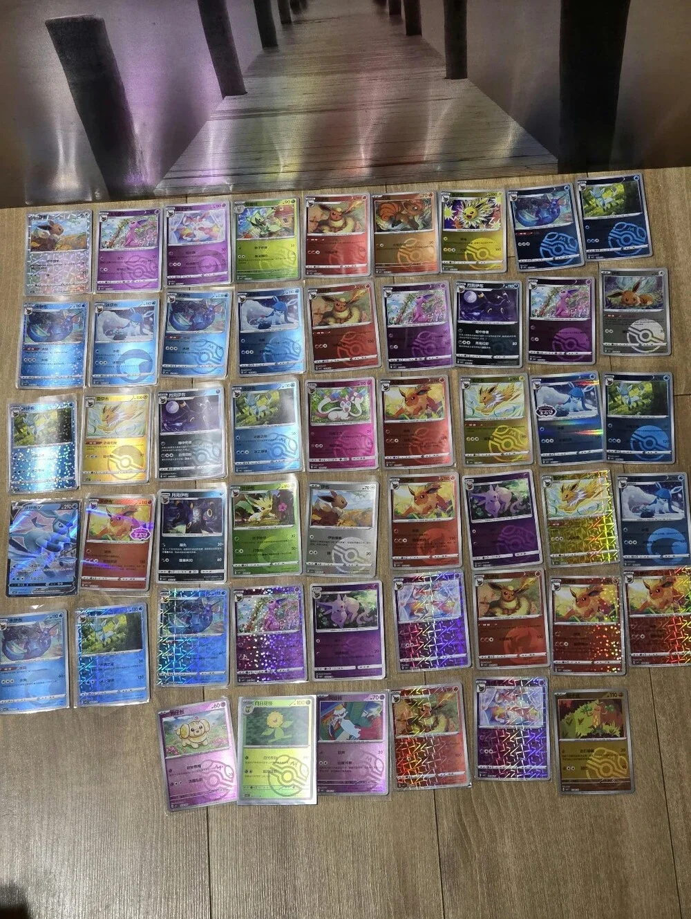 Pokémon TCG Bulk Holo & Rare Card Lot - Assorted Colors Eevee